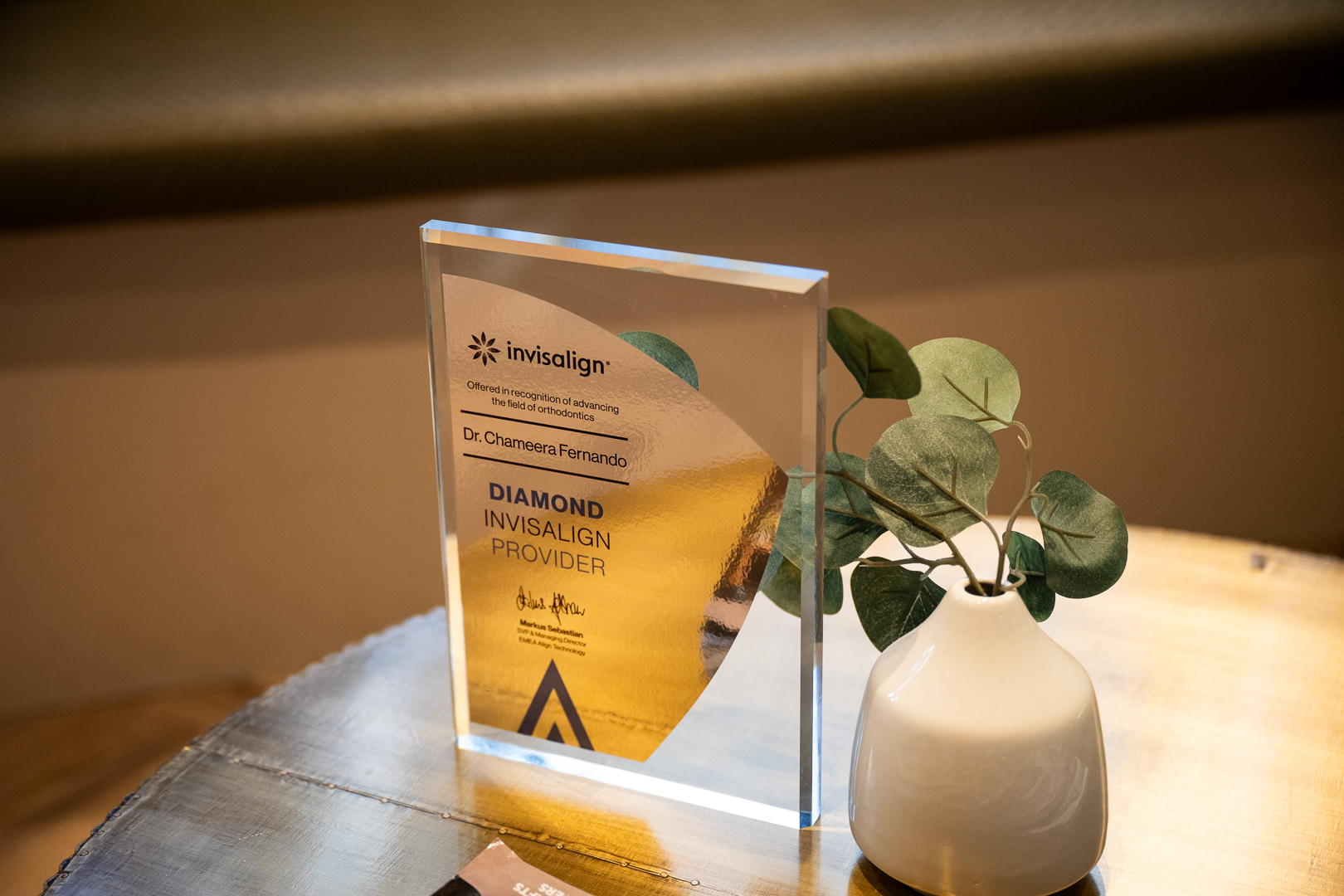 A clear glass award award for providingInvisalign treatments
